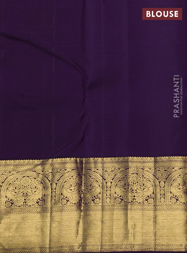 Pure kanchipuram silk saree dual shade of rust and deep violet with zari woven buttas and zari woven border