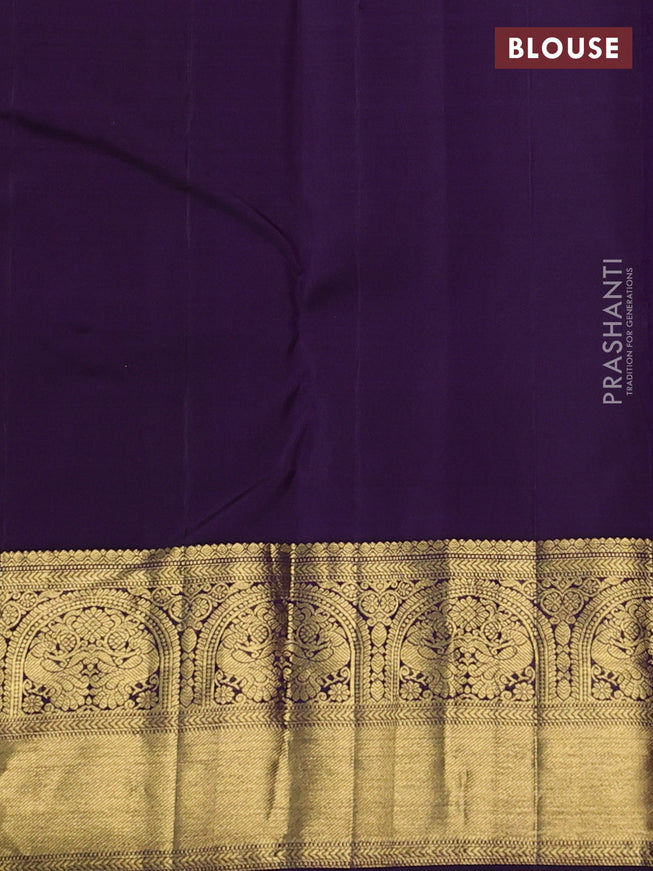 Pure kanchipuram silk saree dual shade of rust and deep violet with zari woven buttas and zari woven border