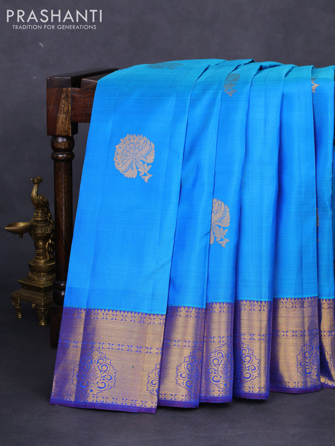 Pure kanchipuram silk saree cs blue and blue with floral zari woven buttas and zari woven border