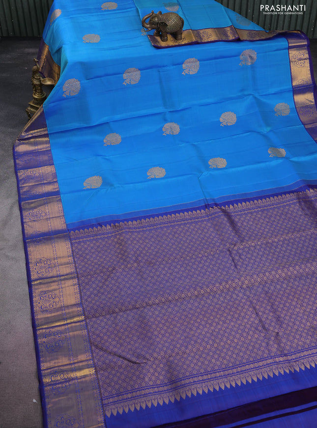 Pure kanchipuram silk saree cs blue and blue with floral zari woven buttas and zari woven border