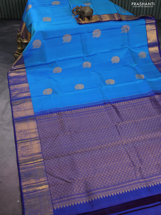 Pure kanchipuram silk saree cs blue and blue with floral zari woven buttas and zari woven border