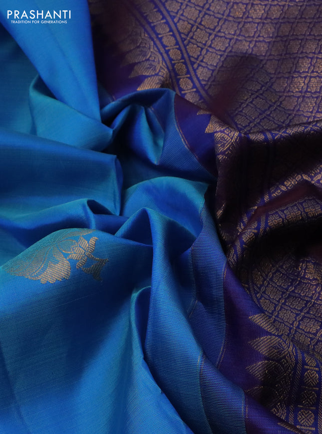 Pure kanchipuram silk saree cs blue and blue with floral zari woven buttas and zari woven border