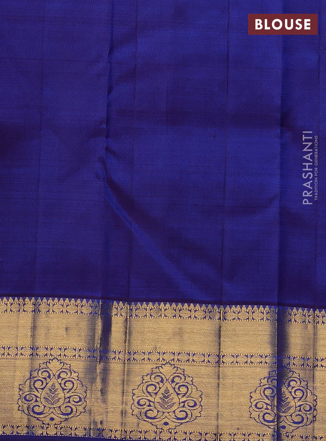 Pure kanchipuram silk saree cs blue and blue with floral zari woven buttas and zari woven border