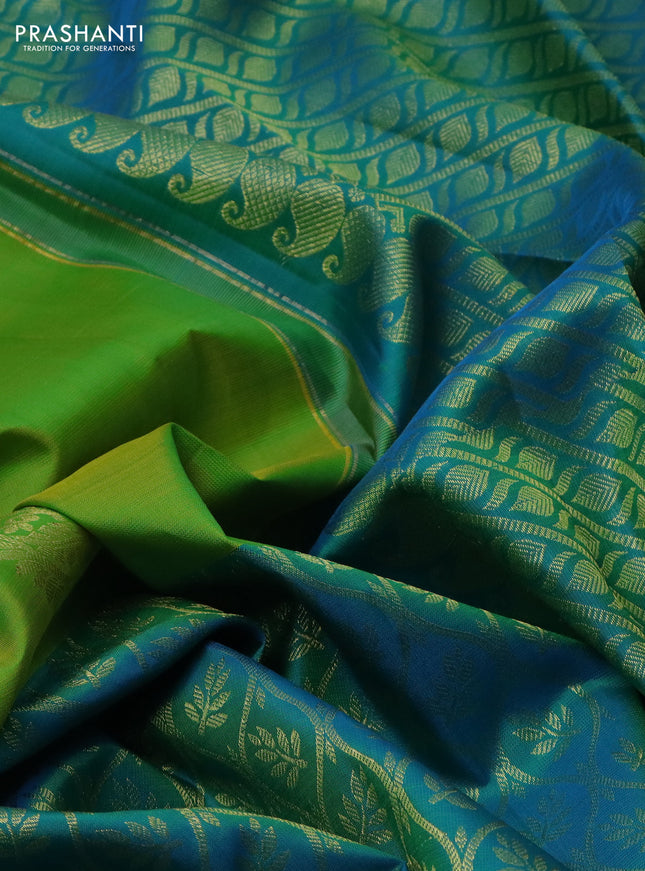 Pure kanchipuram silk saree lime green and teal blue with half & half style and rich zari border