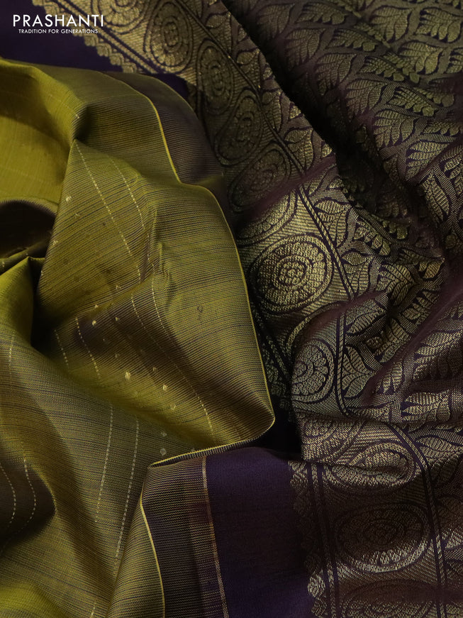 Pure kanchipuram silk saree mehendi green and deep jamun with allover zari weaves and rich zari border