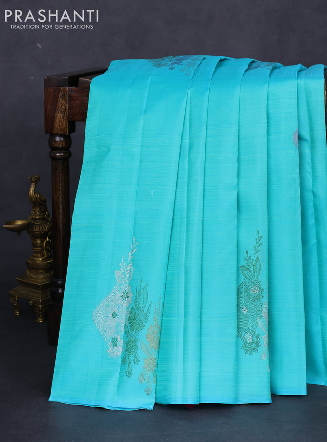 Pure kanchipuram silk saree teal blue and pink with thread & silver woven buttas in borderless style