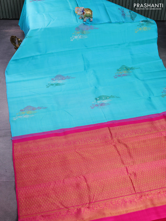 Pure kanchipuram silk saree teal blue and pink with thread & silver woven buttas in borderless style