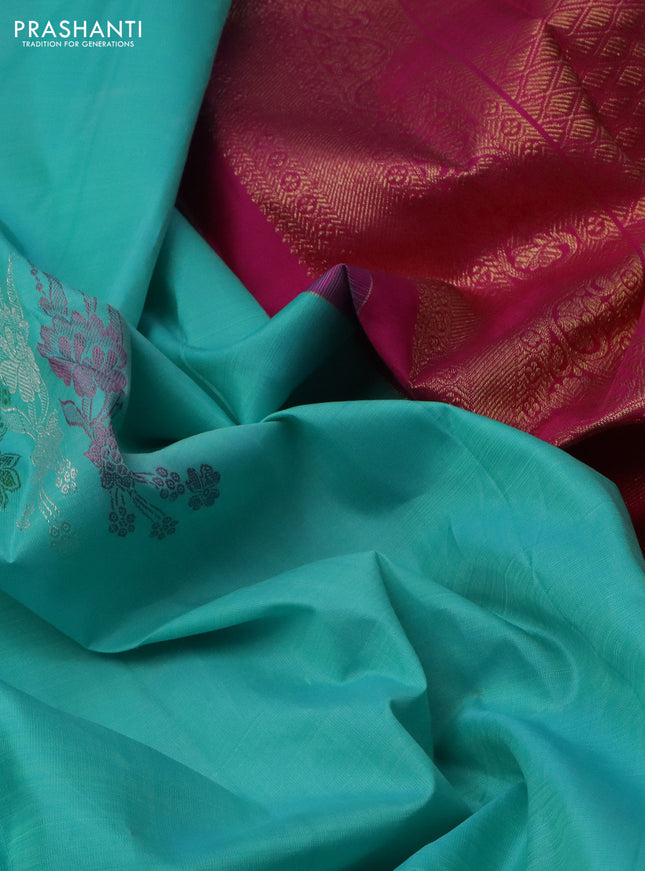 Pure kanchipuram silk saree teal blue and pink with thread & silver woven buttas in borderless style