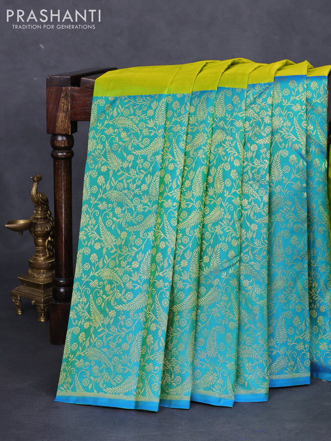 Pure kanchipuram silk saree light green and teal blue with zari woven buttas and long rich zari woven border