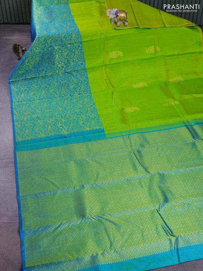 Pure kanchipuram silk saree light green and teal blue with zari woven buttas and long rich zari woven border