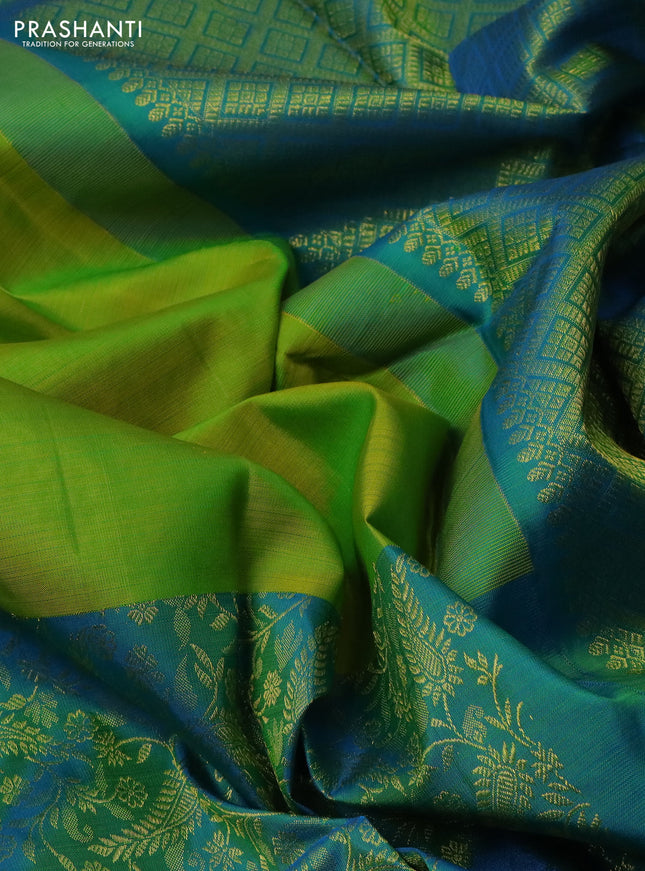 Pure kanchipuram silk saree light green and teal blue with zari woven buttas and long rich zari woven border
