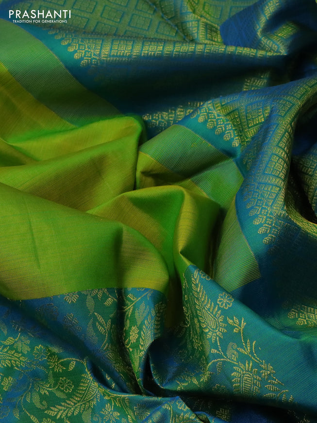 Pure kanchipuram silk saree light green and teal blue with zari woven buttas and long rich zari woven border