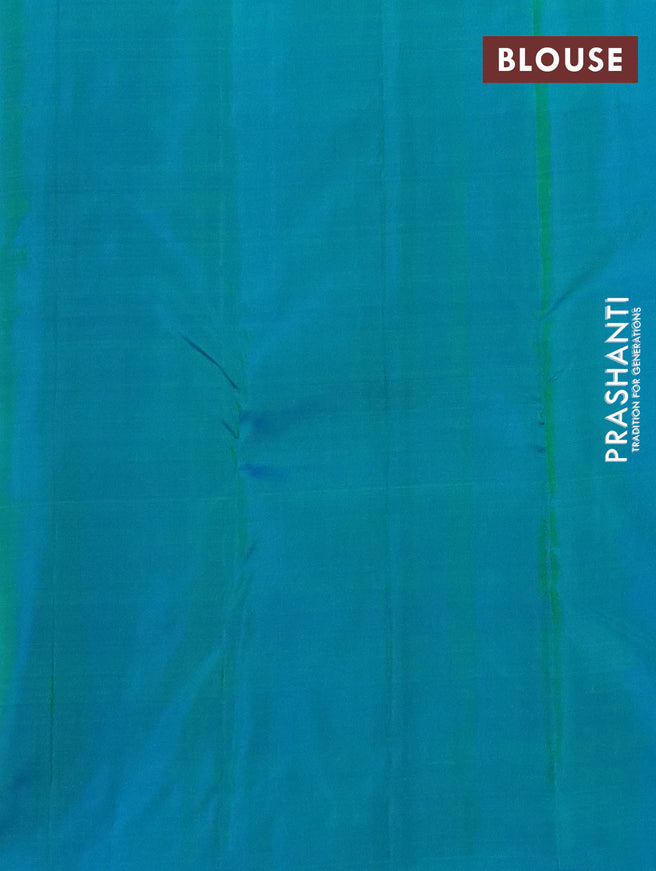 Pure kanchipuram silk saree light green and teal blue with zari woven buttas and long rich zari woven border