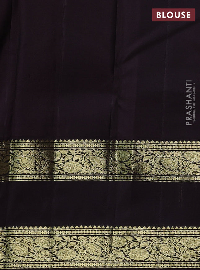 Pure kanchipuram silk saree dual shade of green and deep jamun with allover zari stripes pattern and zari woven border