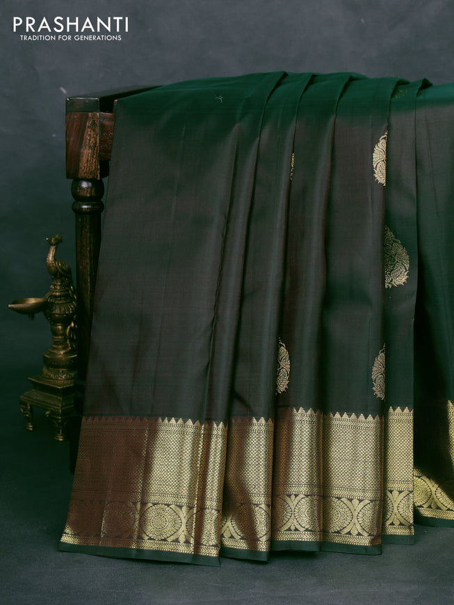 Pure kanchipuram silk saree dual shade of bottle green with zari woven buttas and zari woven border