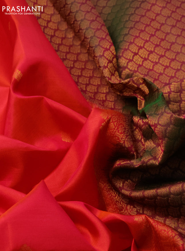 Pure kanchipuram silk saree dual shade of pinkish orange and dual shade of green with zari woven buttas and zari woven simple border