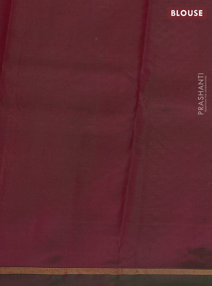 Pure kanchipuram silk saree dual shade of pinkish orange and dual shade of green with zari woven buttas and zari woven simple border