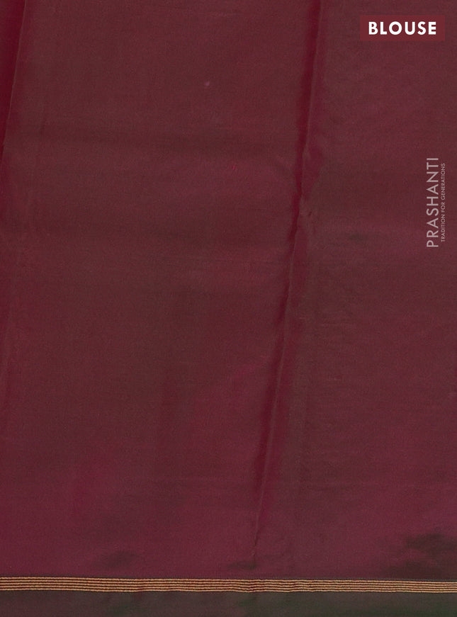 Pure kanchipuram silk saree dual shade of pinkish orange and dual shade of green with zari woven buttas and zari woven simple border