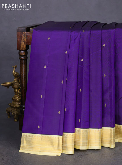 Pure kanchipuram silk saree blue and pale yellow with zari woven buttas and zari woven korvai border