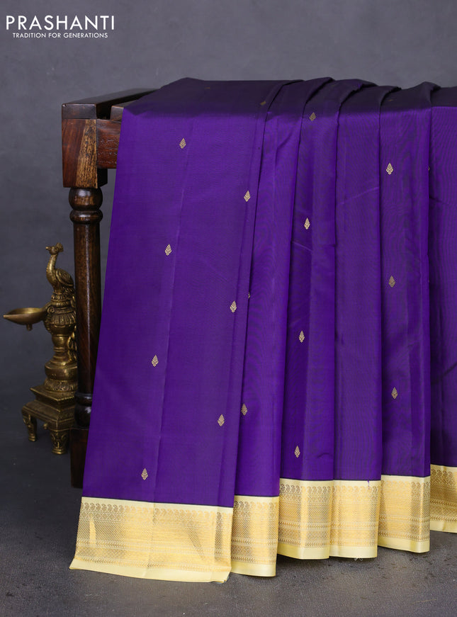 Pure kanchipuram silk saree blue and pale yellow with zari woven buttas and zari woven korvai border