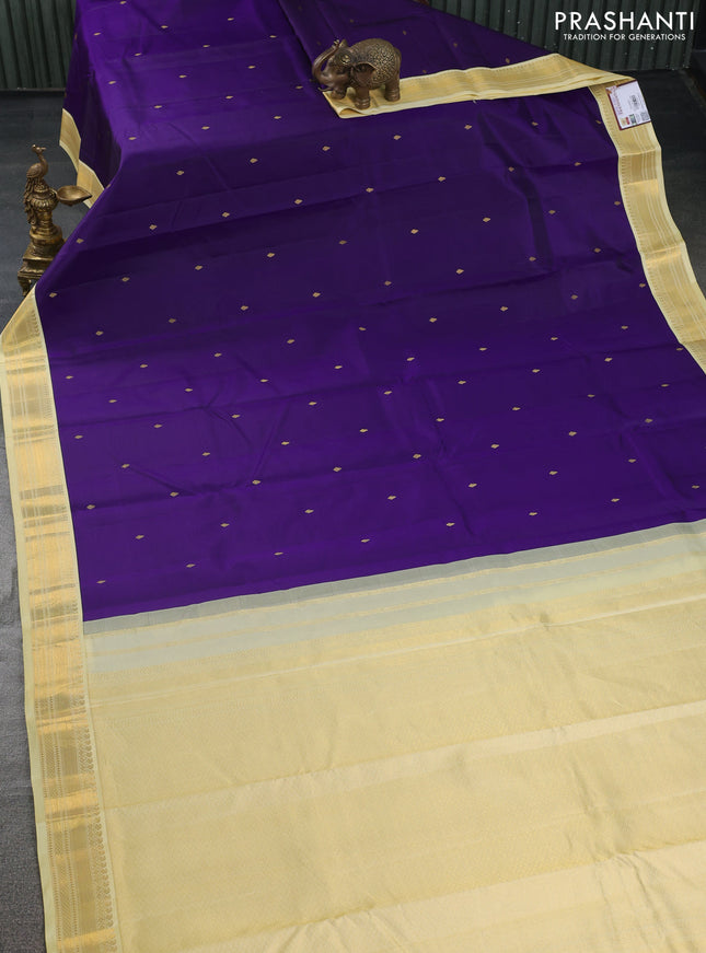 Pure kanchipuram silk saree blue and pale yellow with zari woven buttas and zari woven korvai border