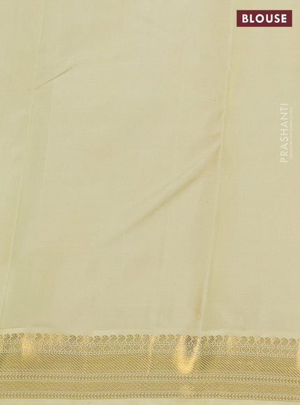 Pure kanchipuram silk saree blue and pale yellow with zari woven buttas and zari woven korvai border