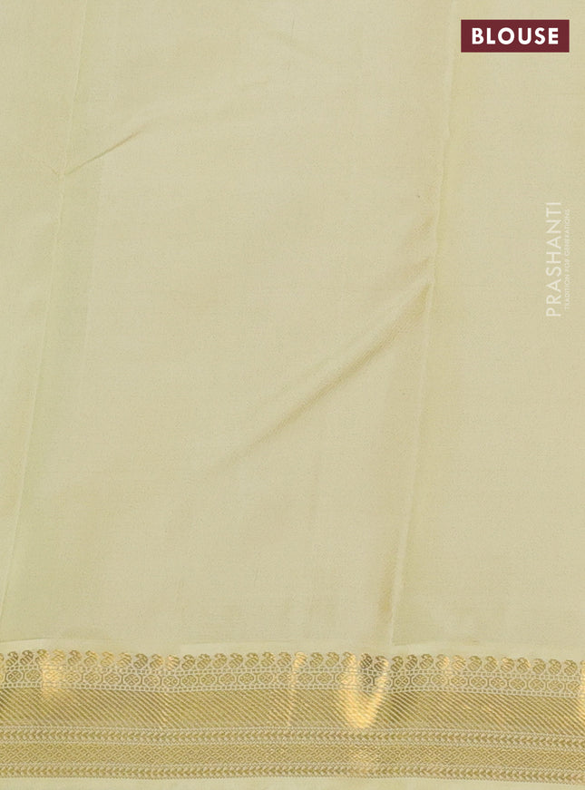 Pure kanchipuram silk saree blue and pale yellow with zari woven buttas and zari woven korvai border