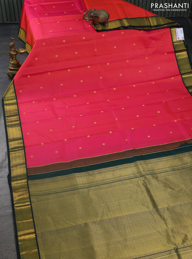 Pure kanchipuram silk saree dual shade of pinkish orange and bottle green with zari woven buttas and zari woven korvai border