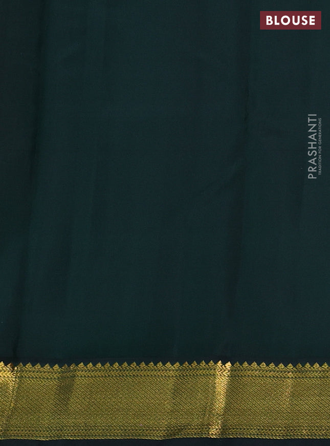 Pure kanchipuram silk saree dual shade of pinkish orange and bottle green with zari woven buttas and zari woven korvai border