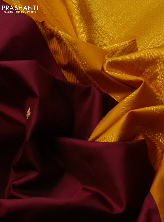 Pure kanchipuram silk saree deep maroon and yellow with zari woven buttas and zari woven korvai border