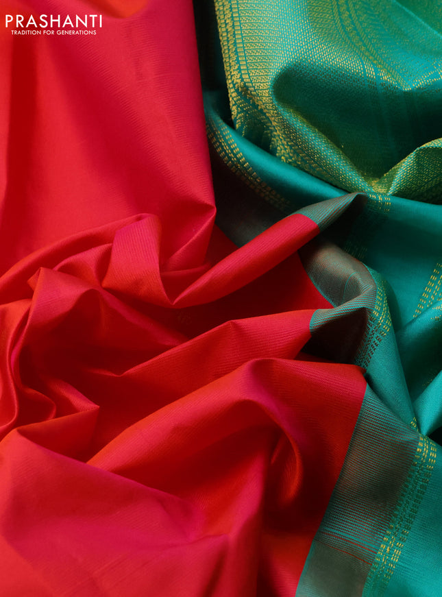 Pure kanchipuram silk saree dual shade of pinkish orange and teal green with zari woven buttas and zari woven korvai border