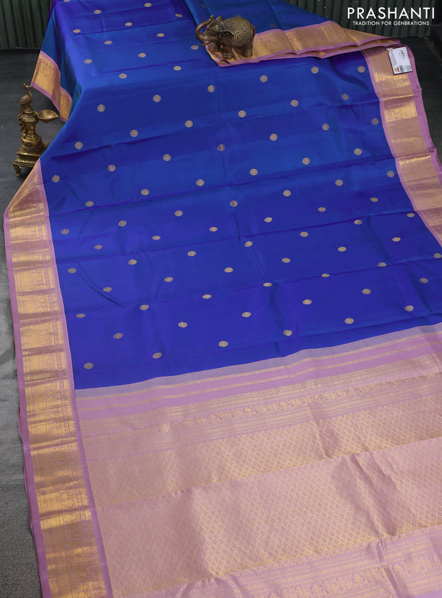 Pure kanchipuram silk saree dual shade of teal blue and mauve pink with zari woven buttas and zari woven korvai border