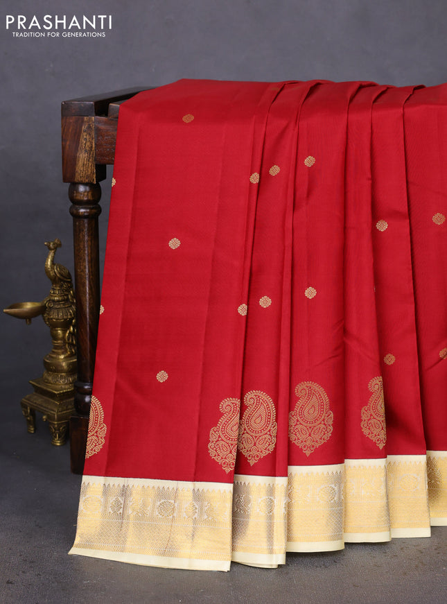 Pure kanchipuram silk saree maroon and cream with zari woven buttas and zari woven korvai border