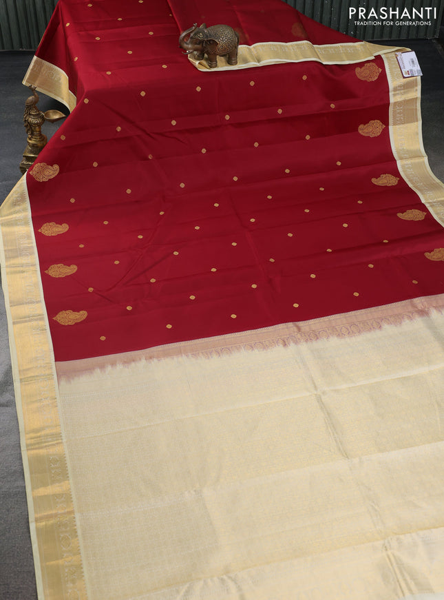 Pure kanchipuram silk saree maroon and cream with zari woven buttas and zari woven korvai border