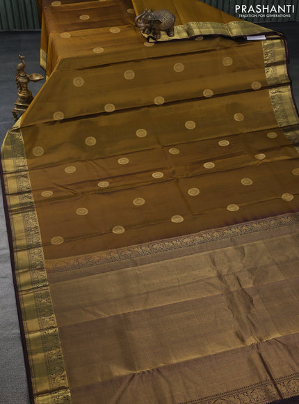 Pure kanchipuram silk saree mehendi green and coffee brown with zari woven buttas and zari woven border