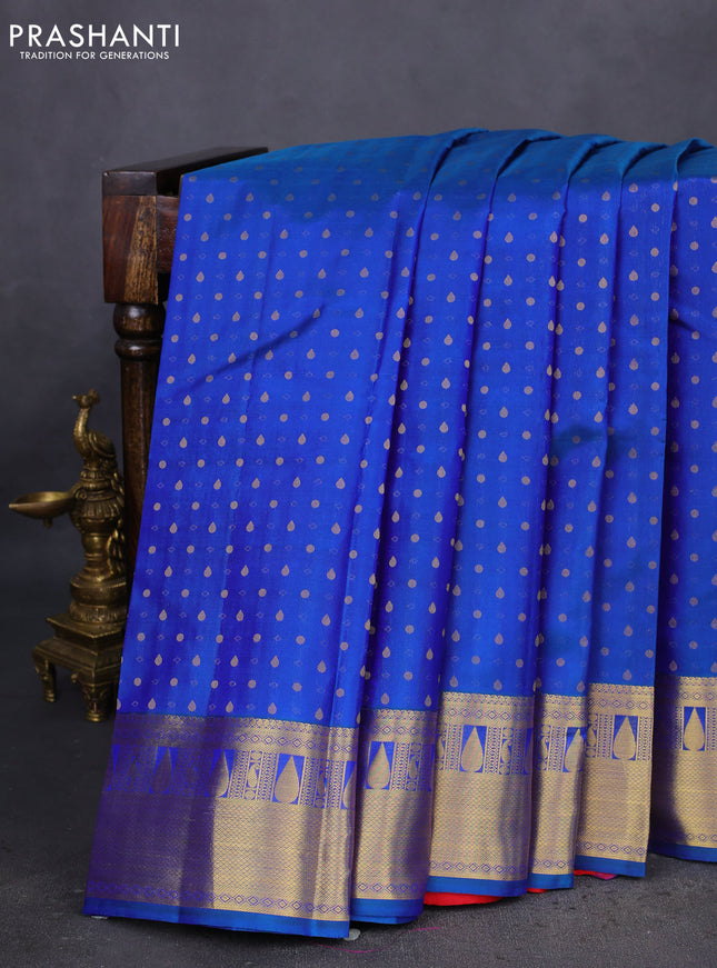 Pure kanchipuram silk saree dual shade of bluish green and red with allover zari woven 1000 buttas and zari woven border
