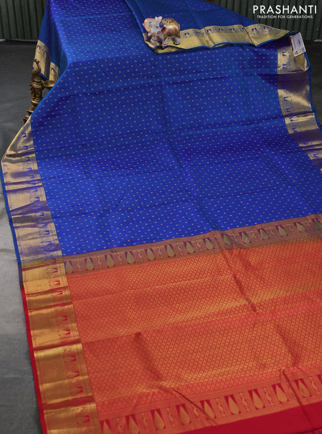 Pure kanchipuram silk saree dual shade of bluish green and red with allover zari woven 1000 buttas and zari woven border