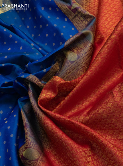Pure kanchipuram silk saree dual shade of bluish green and red with allover zari woven 1000 buttas and zari woven border