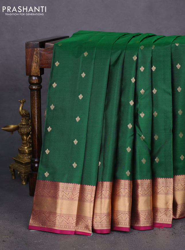 Pure kanchipuram silk saree dark green and dark magenta pink with zari woven buttas and zari woven border