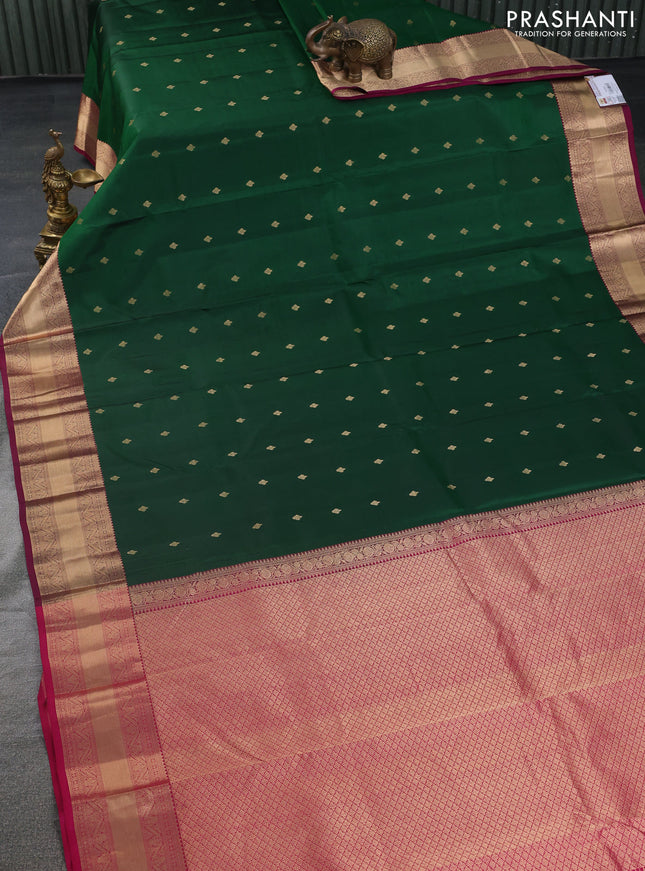 Pure kanchipuram silk saree dark green and dark magenta pink with zari woven buttas and zari woven border