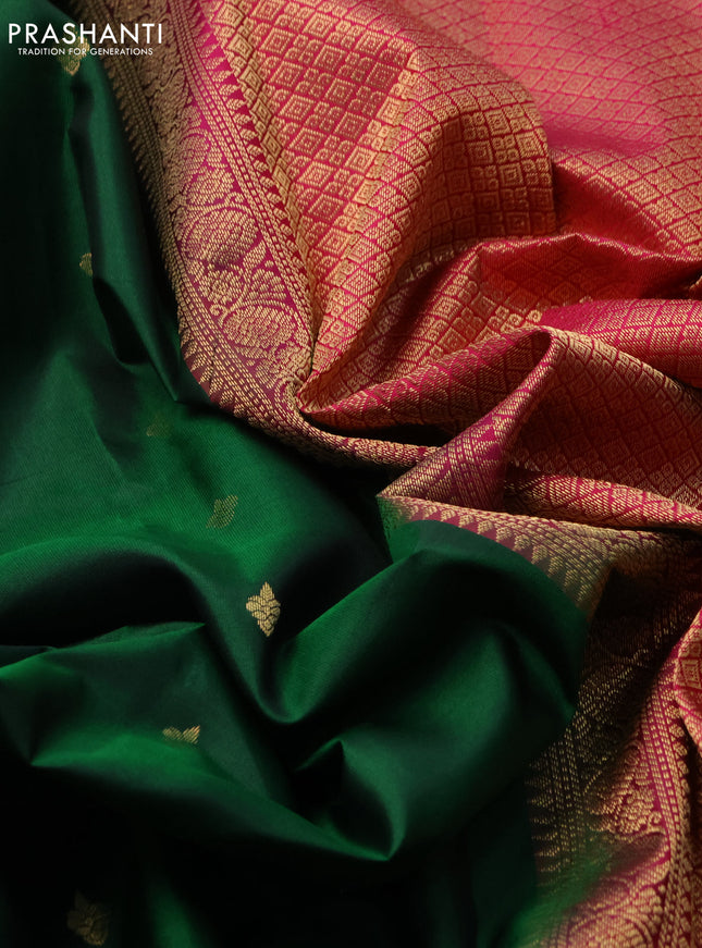 Pure kanchipuram silk saree dark green and dark magenta pink with zari woven buttas and zari woven border