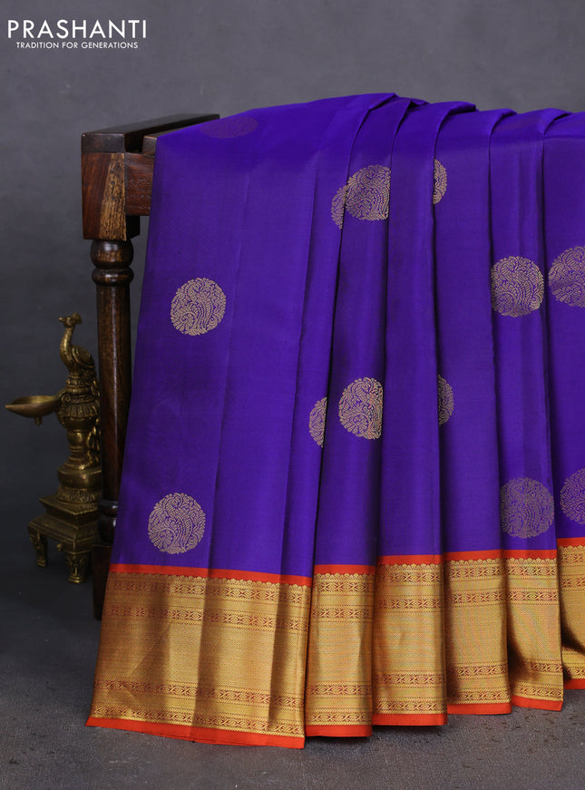 Pure kanchipuram silk saree blue and rustic orange with zari woven buttas and zari woven border