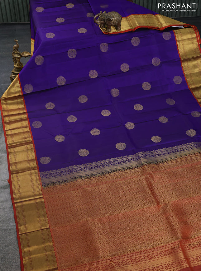 Pure kanchipuram silk saree blue and rustic orange with zari woven buttas and zari woven border
