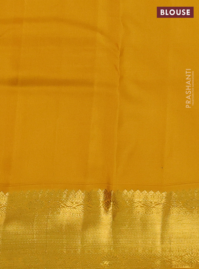 Pure kanchipuram silk saree green and mustard yellow with zari woven buttas and zari woven korvai border