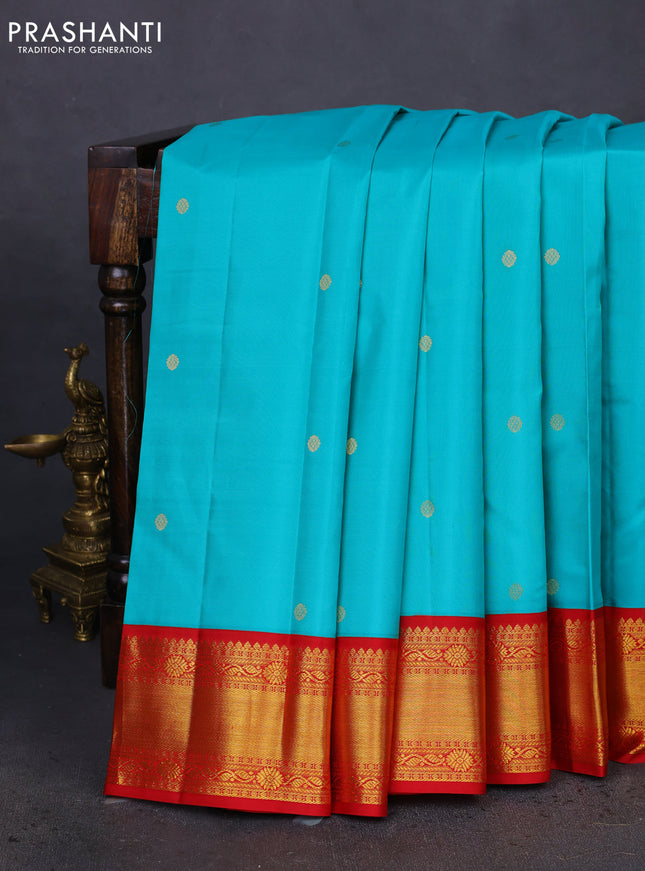 Pure kanchipuram silk saree teal blue and red with zari woven buttas and zari woven korvai border