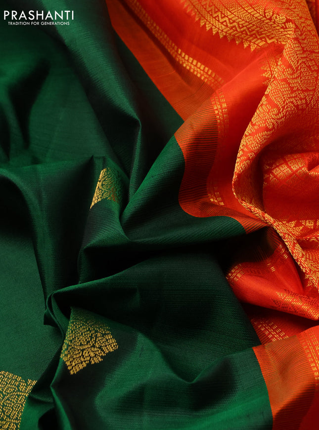 Pure kanchipuram silk saree green and orange with zari woven buttas and zari woven korvai border
