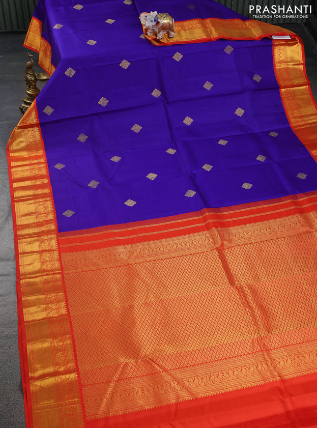 Pure kanchipuram silk saree blue and orange with zari woven buttas and zari woven korvai border