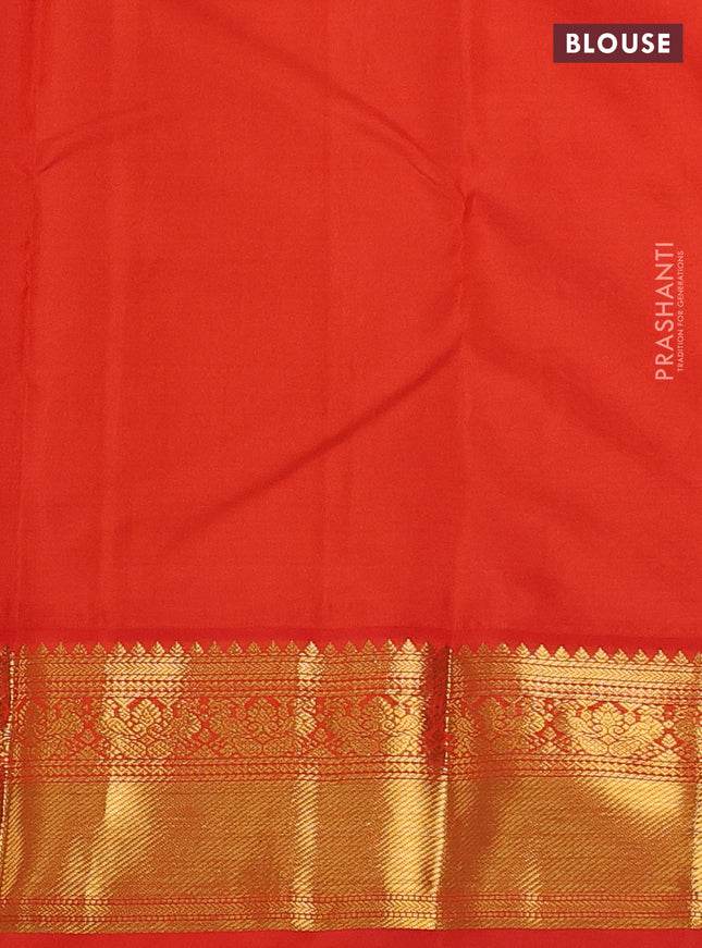 Pure kanchipuram silk saree blue and orange with zari woven buttas and zari woven korvai border
