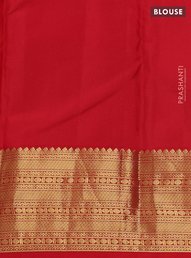 Pure kanchipuram silk saree dual shade of blue and red with peacock zari woven buttas and zari woven korvai border