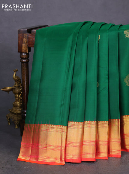 Pure kanchipuram silk saree green and dual shade of pinkish orange with zari woven buttas and zari woven border